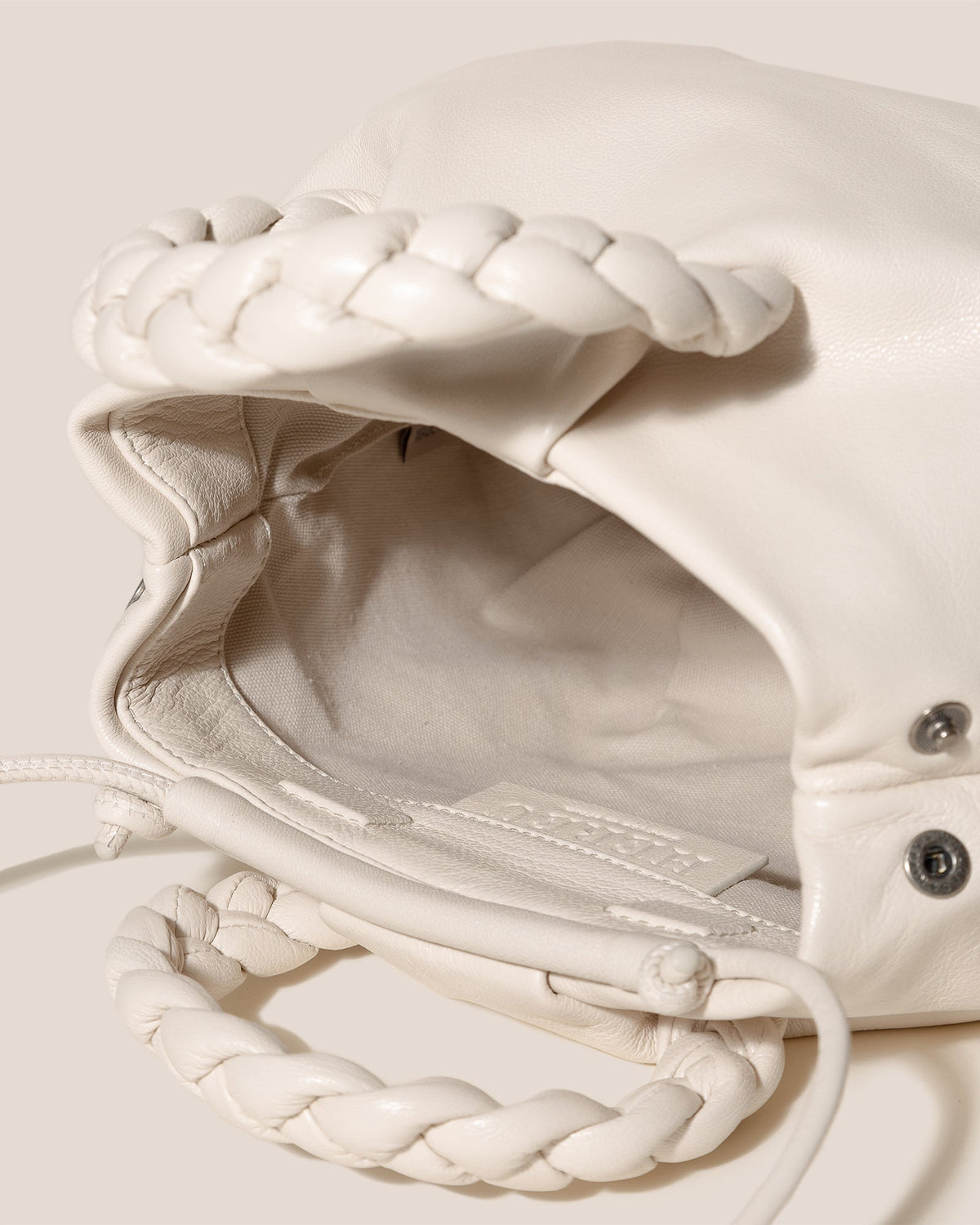 BOMBON SUPPLE SHINY - Plaited-handle Leather Handbag