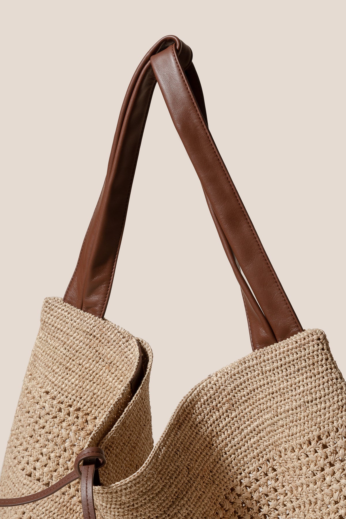 CADOR - Slouchy Crocheted Raffia Shoulder Bag