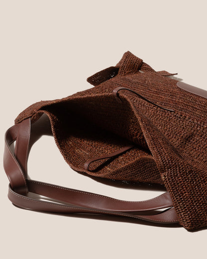 CADOR - Slouchy Crocheted Raffia Shoulder Bag
