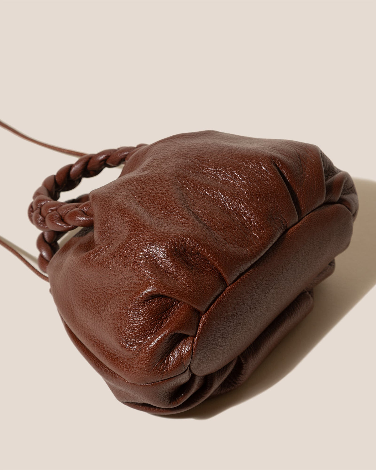 BOMBON SUPPLE SHINY - Plaited-handle Leather Handbag