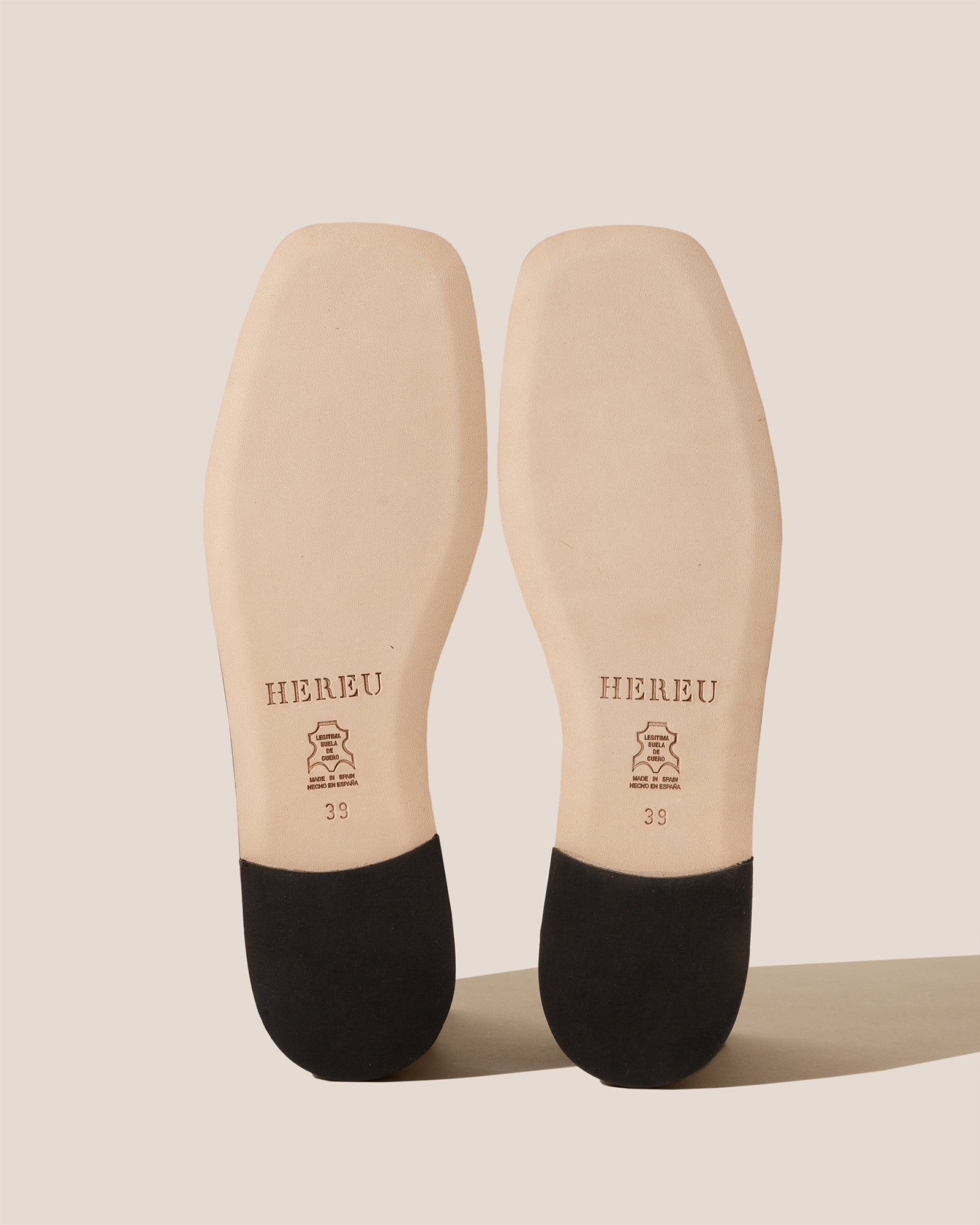 RONDAIA - Woven Asymmetrical Sandal